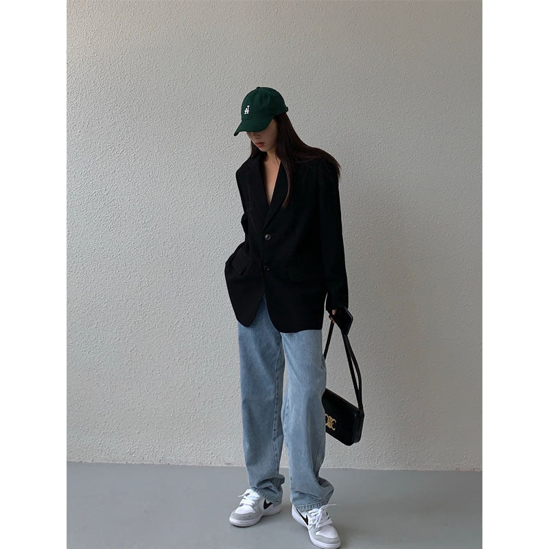 Damski blazer o luźnym kroju z klasycznymi klapami i guzikiem - 1 - Stylpuls
