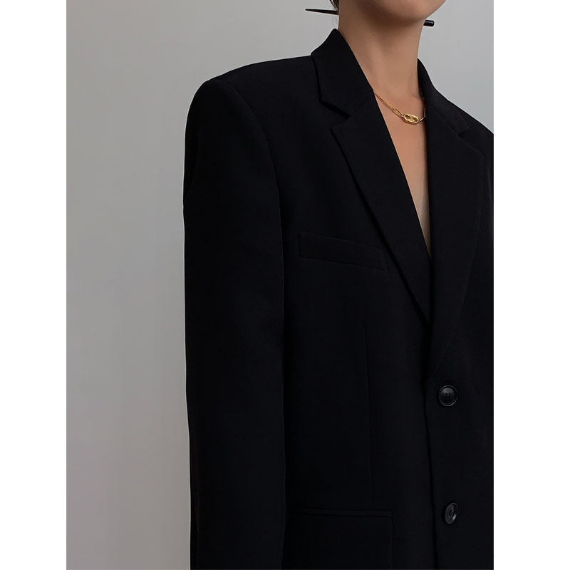 Damski blazer o luźnym kroju z klasycznymi klapami i guzikiem - 5 - Stylpuls